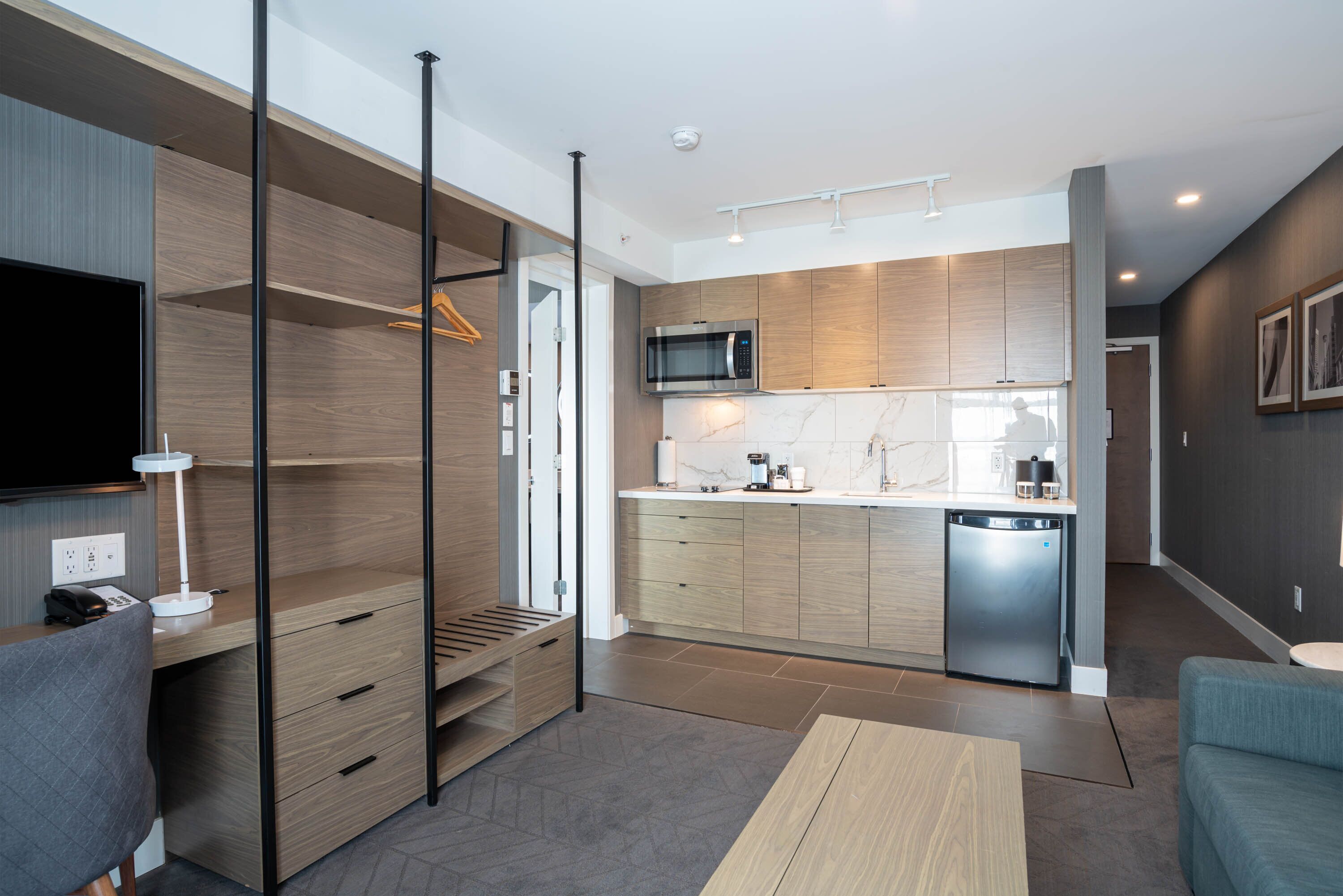 signature suite, 1 king bed with sofa bed, kitchenette | 1 bedroom, premium bedding, in-room safe, desk