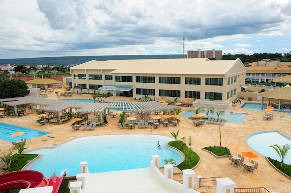 12 outdoor pools, pool umbrellas, pool loungers
