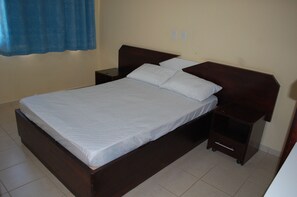 Apartamento família, 3 quartos | Comodidades do quarto