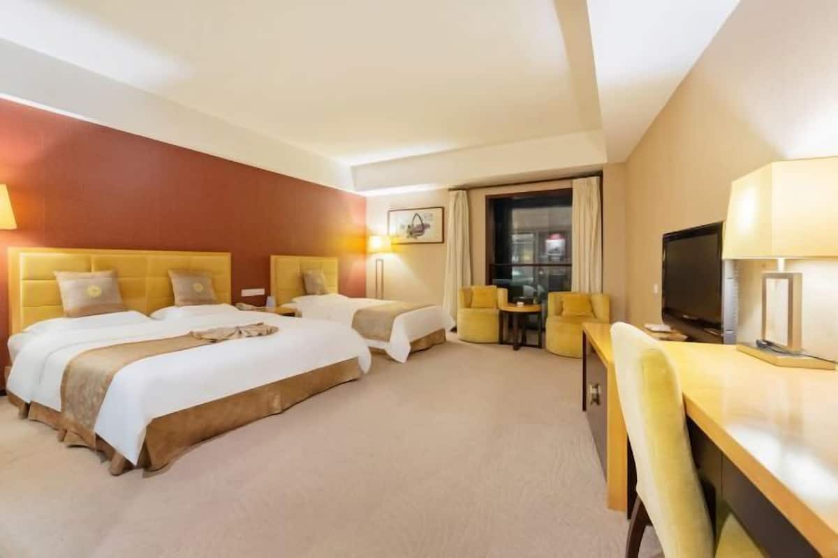 Minibar, coffres-forts dans les chambres, bureau, rideaux occultants