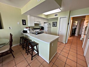 Condo, 1 Bedroom | Private kitchen | Fridge, microwave, oven, dishwasher - Seacrest 702 1 Bedroom Condo by RedAwning (Gulf Shores)