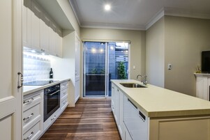 Aloha Luxury Central Apartment (4) | Private kitchen | Full-size fridge, microwave, oven, stovetop