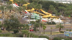 A water park with multiple slides and boats. - Completely Remodeled Corner Unit With Amazing Gulf Views! (Destin)