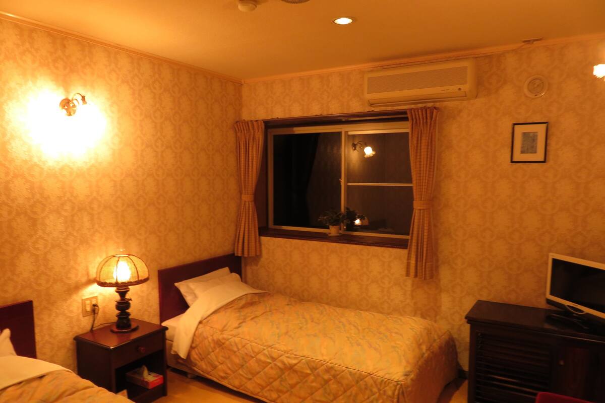 Chambre avec lits jumeaux