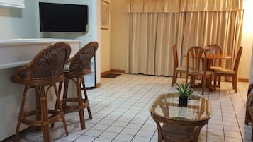 Superior Twin Room, Partial Ocean View | Living area | Flat-screen TV