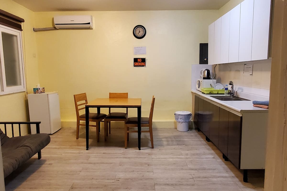 family suite, 2 bedrooms, city view | living area