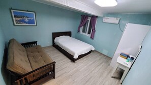 Deluxe Twin Room, 1 Bedroom, City View | Blackout drapes, soundproofing, free WiFi, bed sheets - Daora Guest House (Saipan)