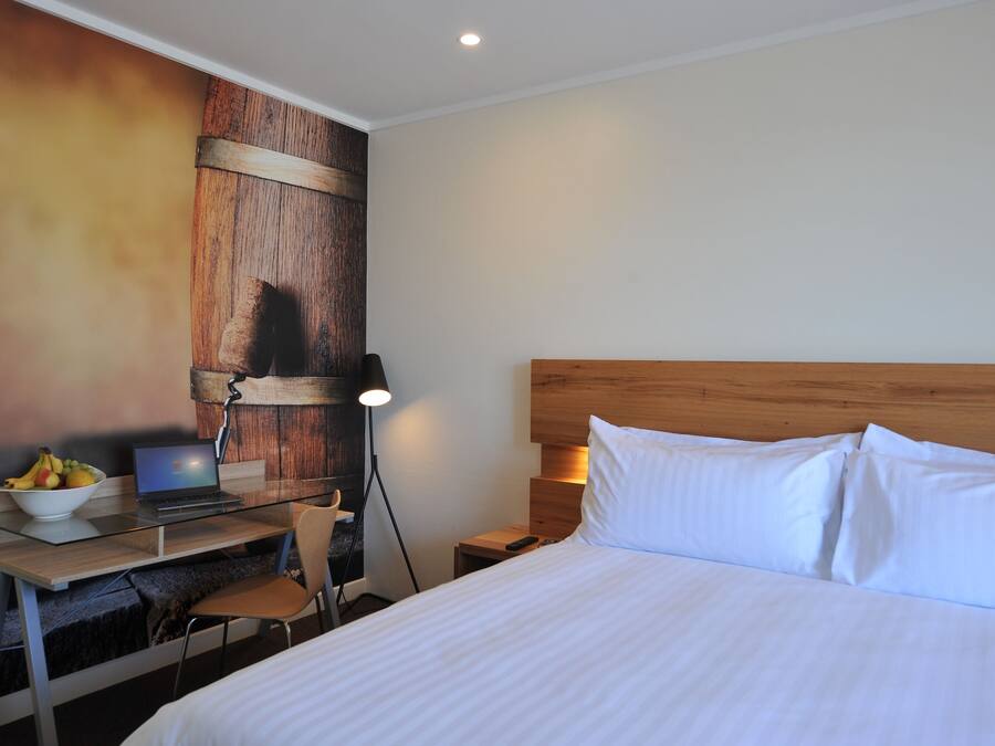 Premium bedding, minibar, desk, iron/ironing board