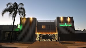 A modern building with a sign for Griff Motel.