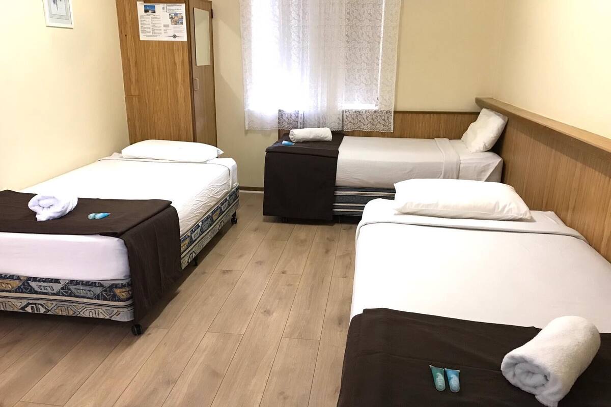 Comfort Triple Room | Laptop workspace, blackout drapes, iron/ironing board (on request)