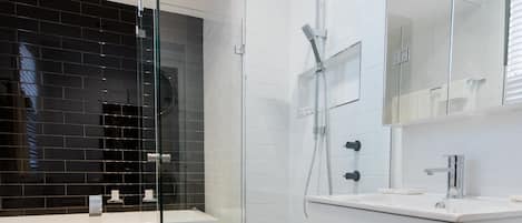Separate bathtub and shower, free toiletries, hair dryer, towels