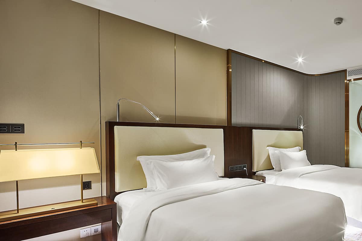 Chambre Deluxe avec lits jumeaux | Literie de qualité supérieure, minibar, coffres-forts dans les chambres