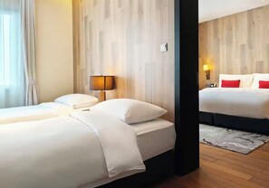Habitación triple Confort | Ropa de cama de alta calidad, minibar, cortinas opacas