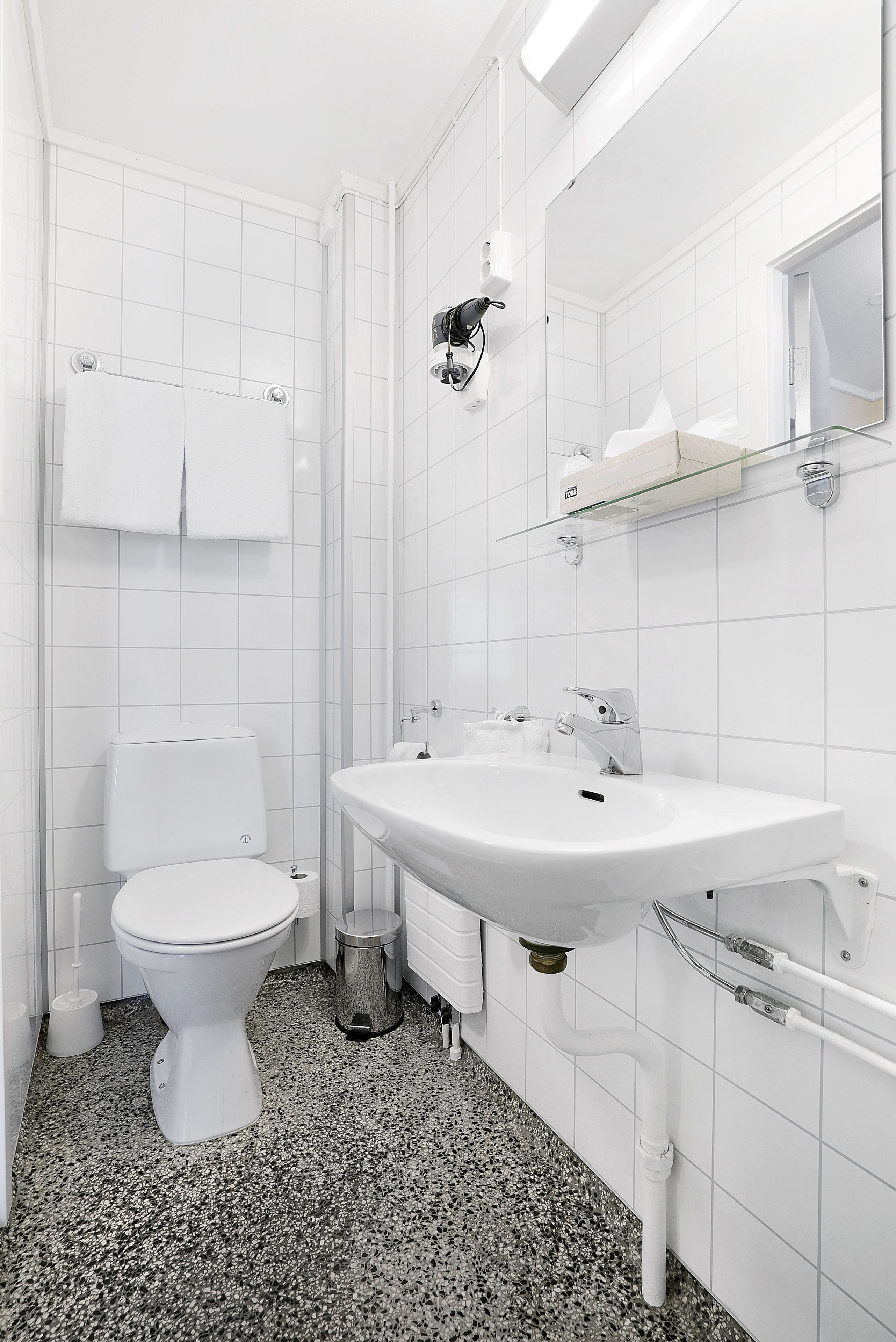 Hair dryer, towels, soap, shampoo
