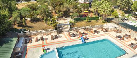 Seasonal outdoor pool, pool umbrellas, sun loungers