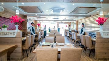 Breakfast, lunch, dinner served; international cuisine