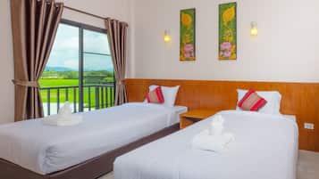 Twin room | Escritorio, cortinas blackout, camas extra y wifi gratis