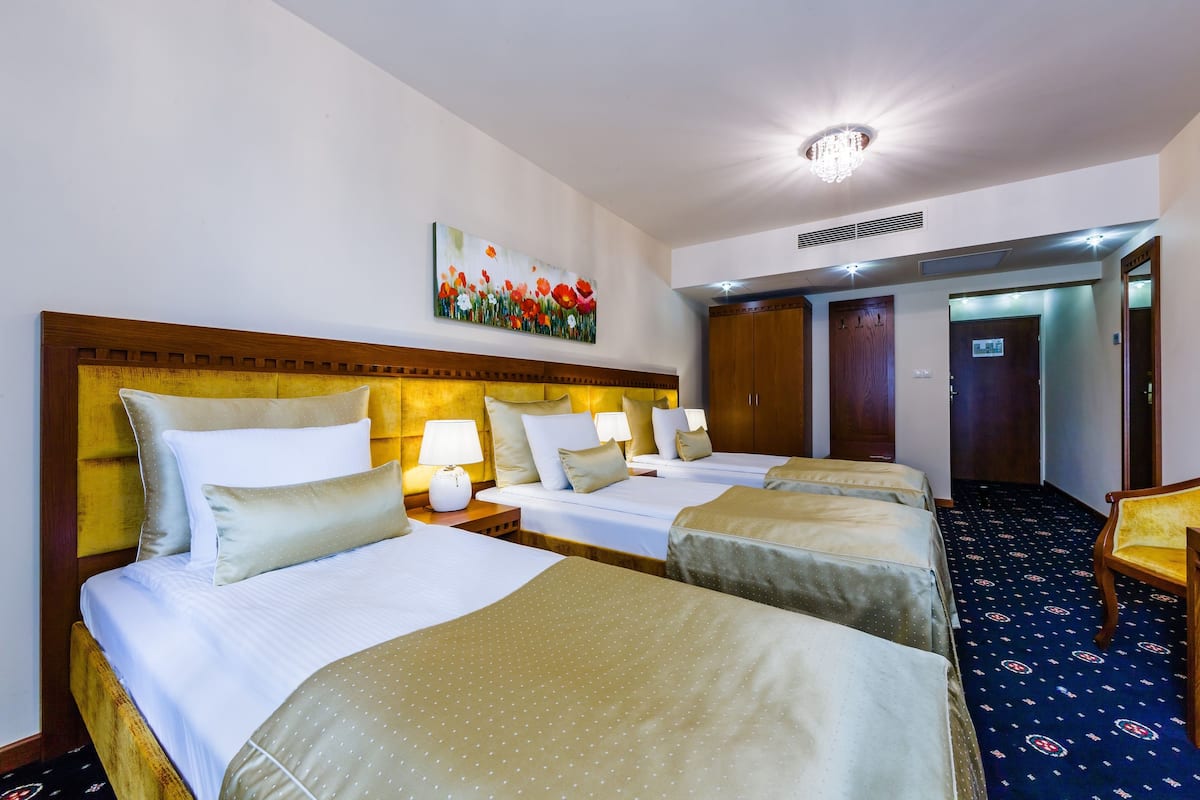 standard triple room | premium bedding, desk, soundproofing, iron/ironing board