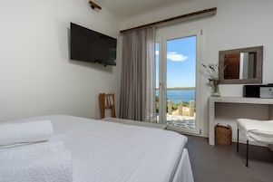 Honeymoon Villa, Fireplace, Sea View | Premium bedding, in-room safe, iron/ironing board, cribs/infant beds