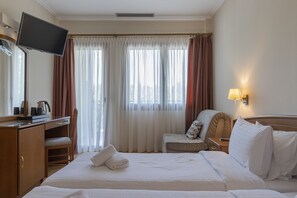 Habitación doble Confort | Sábanas de algodón egipcio, ropa de cama de alta calidad y minibar 