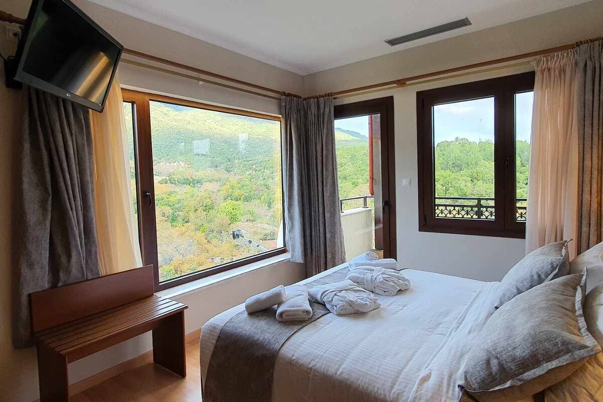 panoramic double room (olympus view) | 1 bedroom, egyptian cotton sheets, premium bedding, minibar