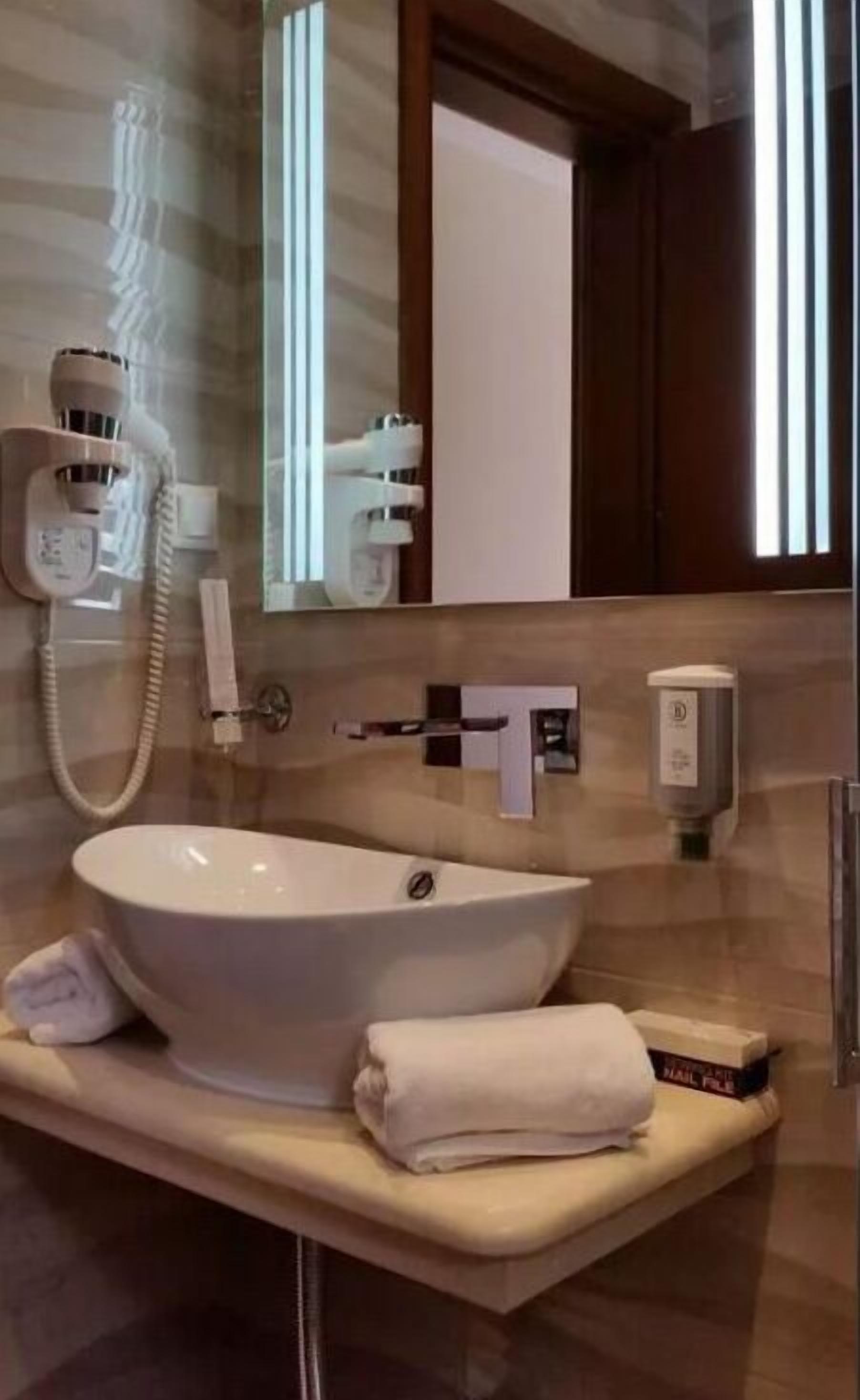 panoramic double room (olympus view) | bathroom sink
