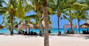 Private beach, white sand, free beach cabanas, sun loungers