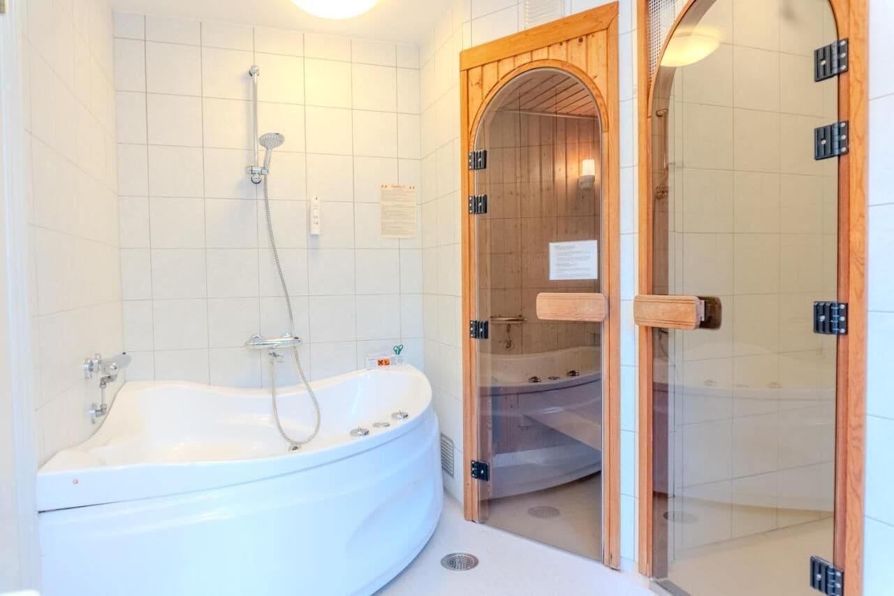 deluxe suite | bathroom | free toiletries, hair dryer, towels, soap