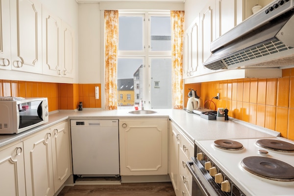 Basic Apartment | Private kitchen | Fridge, coffee/tea maker, electric kettle, highchair