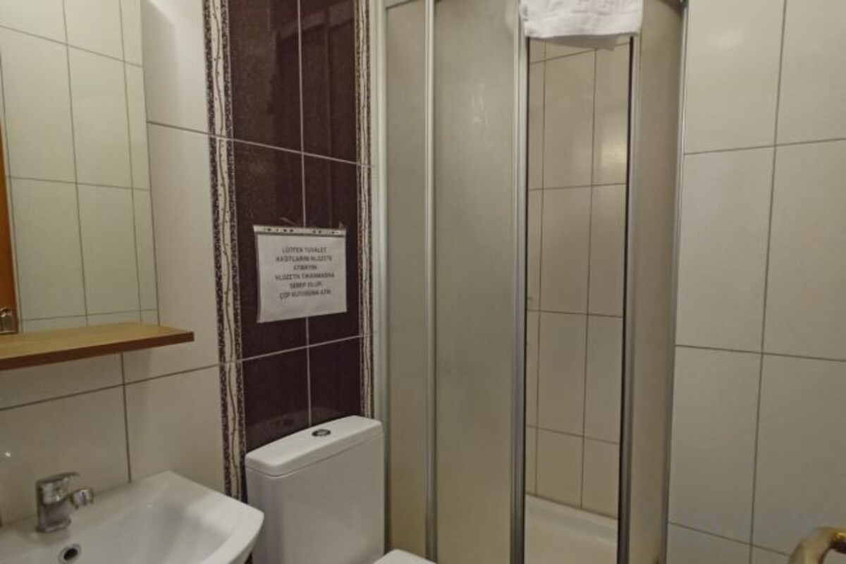 Shower, free toiletries, hair dryer, slippers