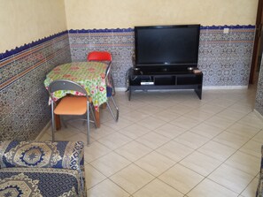 Apartment, Ensuite, Sea View | Living area