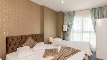 Suíte luxo, 1 quarto | 1 quarto, roupas de cama de algodão egípcio, roupas de cama premium