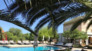 Outdoor pool, pool umbrellas, pool loungers