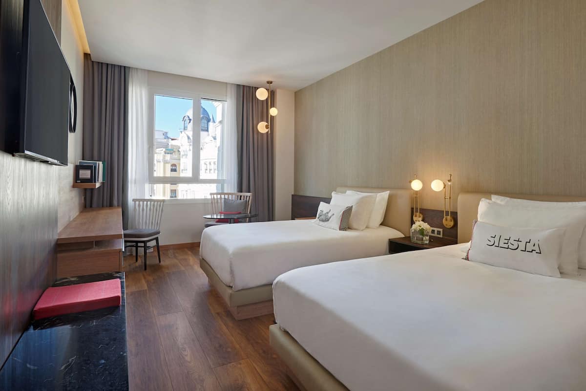 Ropa de cama de alta calidad y minibar