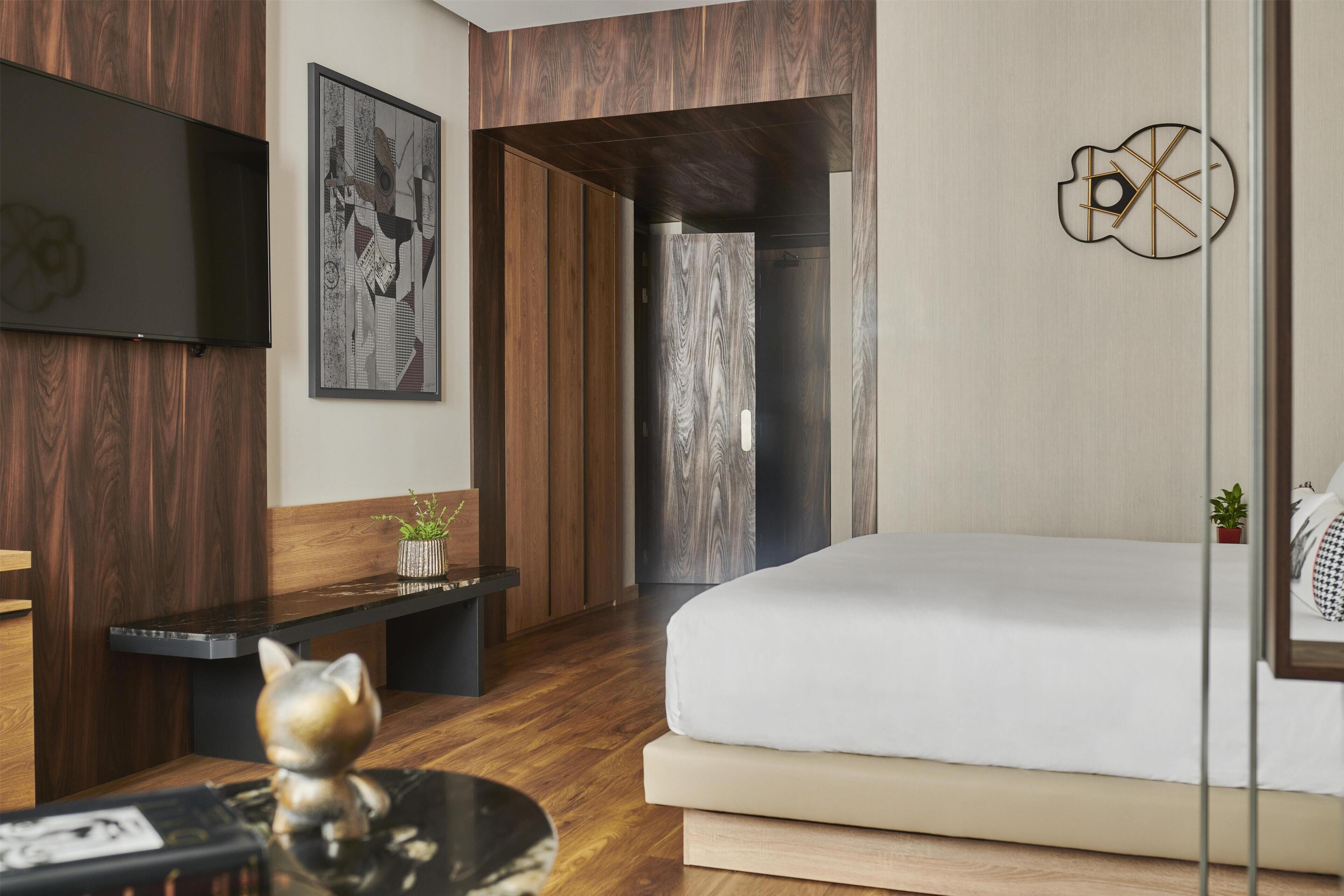 Suite familiar, varias camas, no fumadores | Ropa de cama de alta calidad, minibar, caja fuerte y escritorio