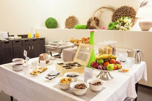 A buffet table with various food items and a coffee station. - Val-vignes Haut-koenigsbourg, The Originals Relais (Saint-Hippolyte)