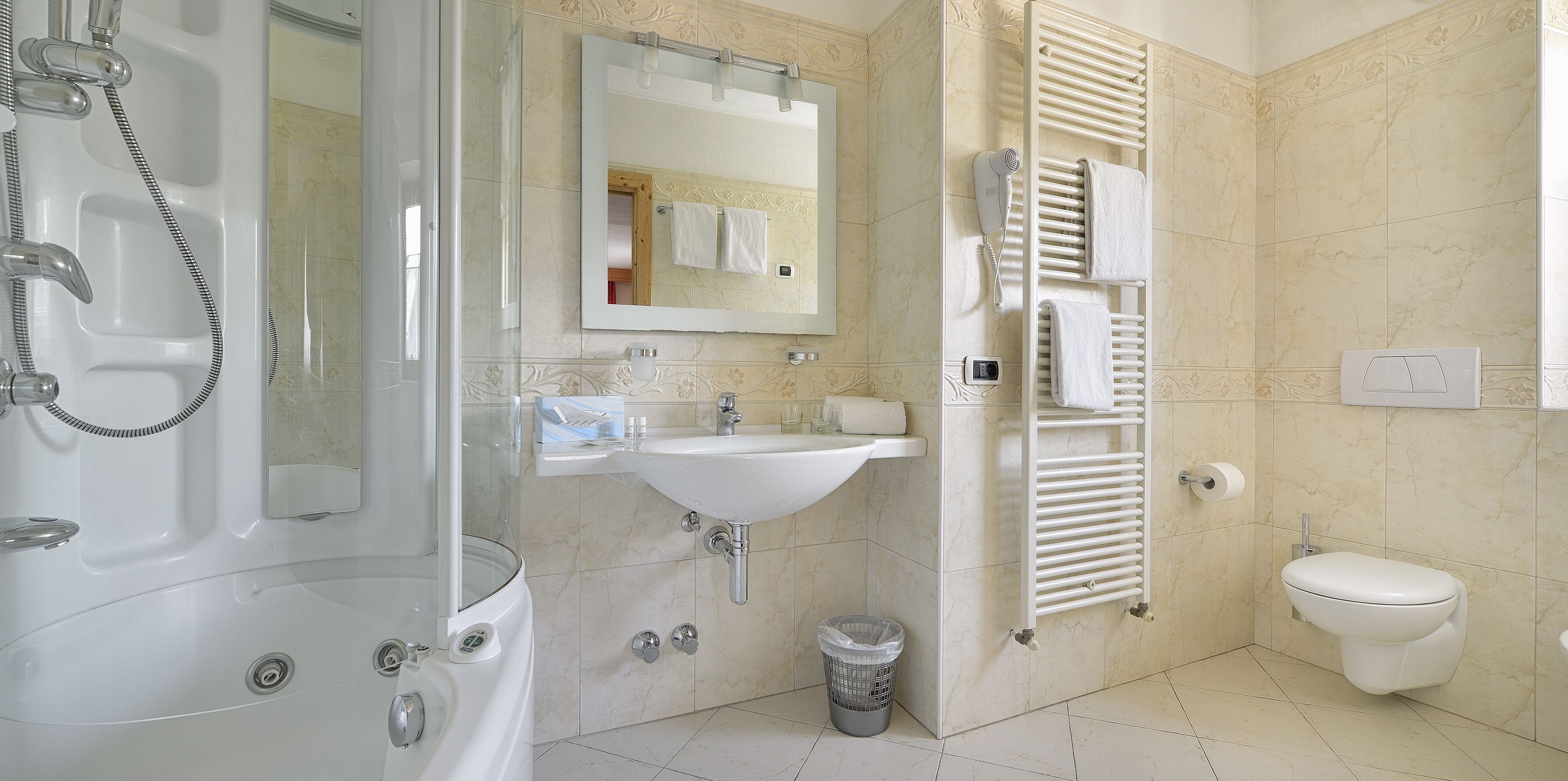 free toiletries, hair dryer, bidet, towels