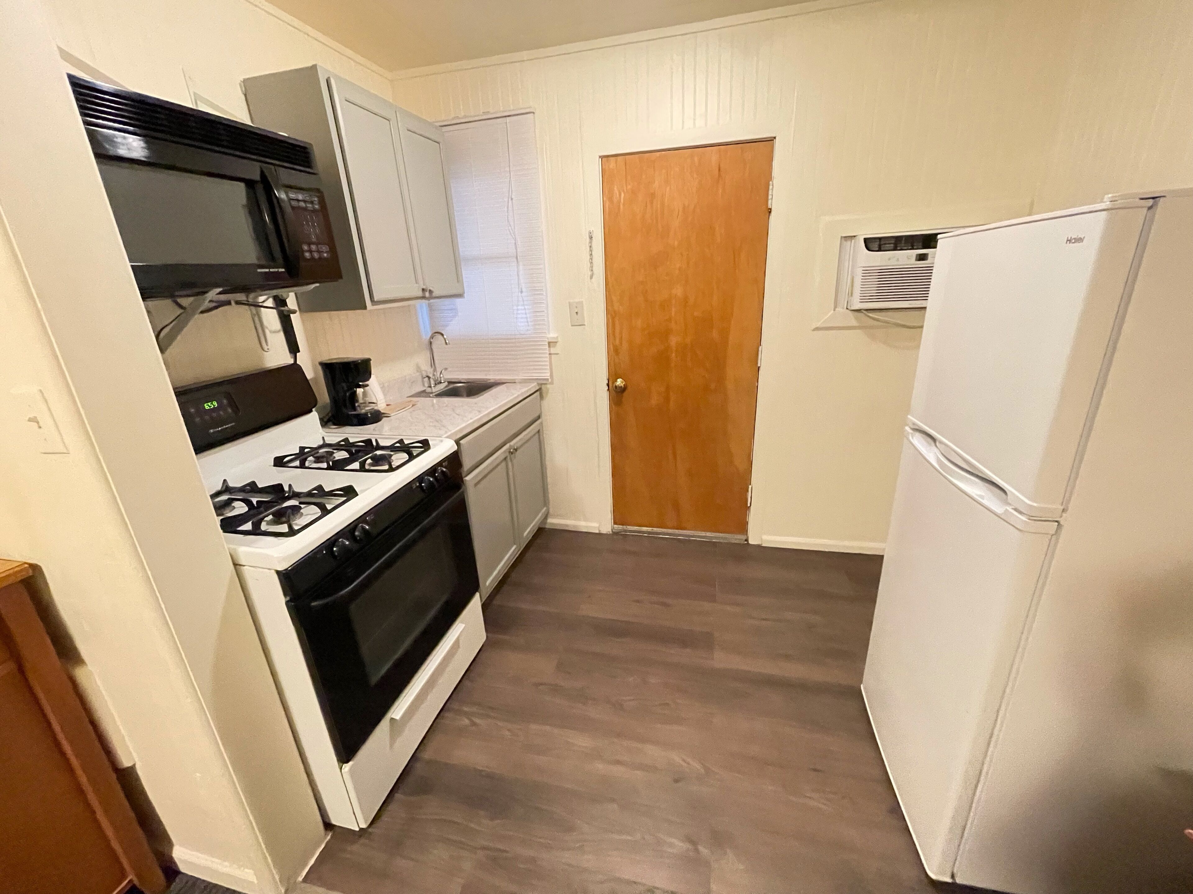 Standard Room, 2 Double Beds, Accessible | Private kitchen | Fridge, microwave, coffee/tea maker