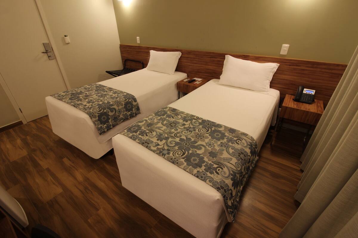Luxury Twin Room | Minibar, in-room safe, desk, blackout curtains
