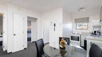Two Bedroom | Private kitchen | Fridge, microwave, stovetop, coffee/tea maker