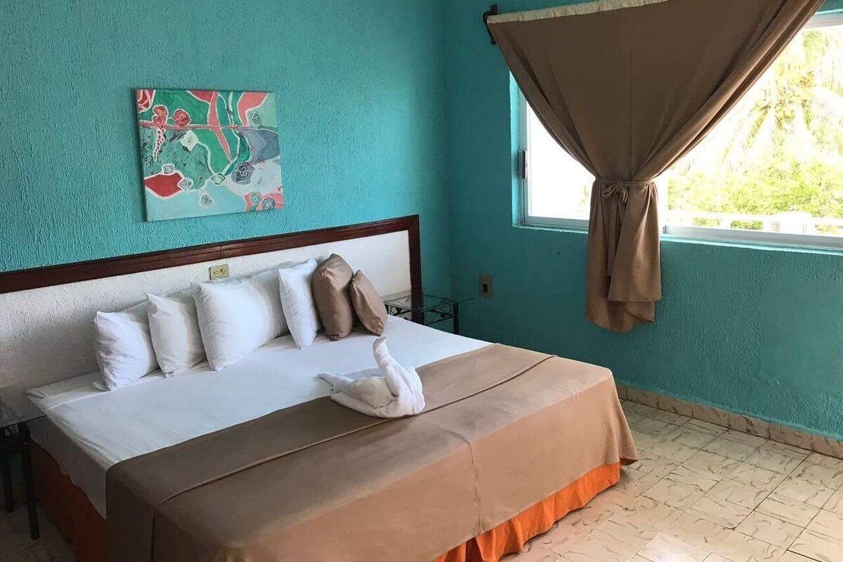 Traditional Double Room, 1 King Bed, Balcony, Garden Area | Desk, WiFi (free), bed sheets