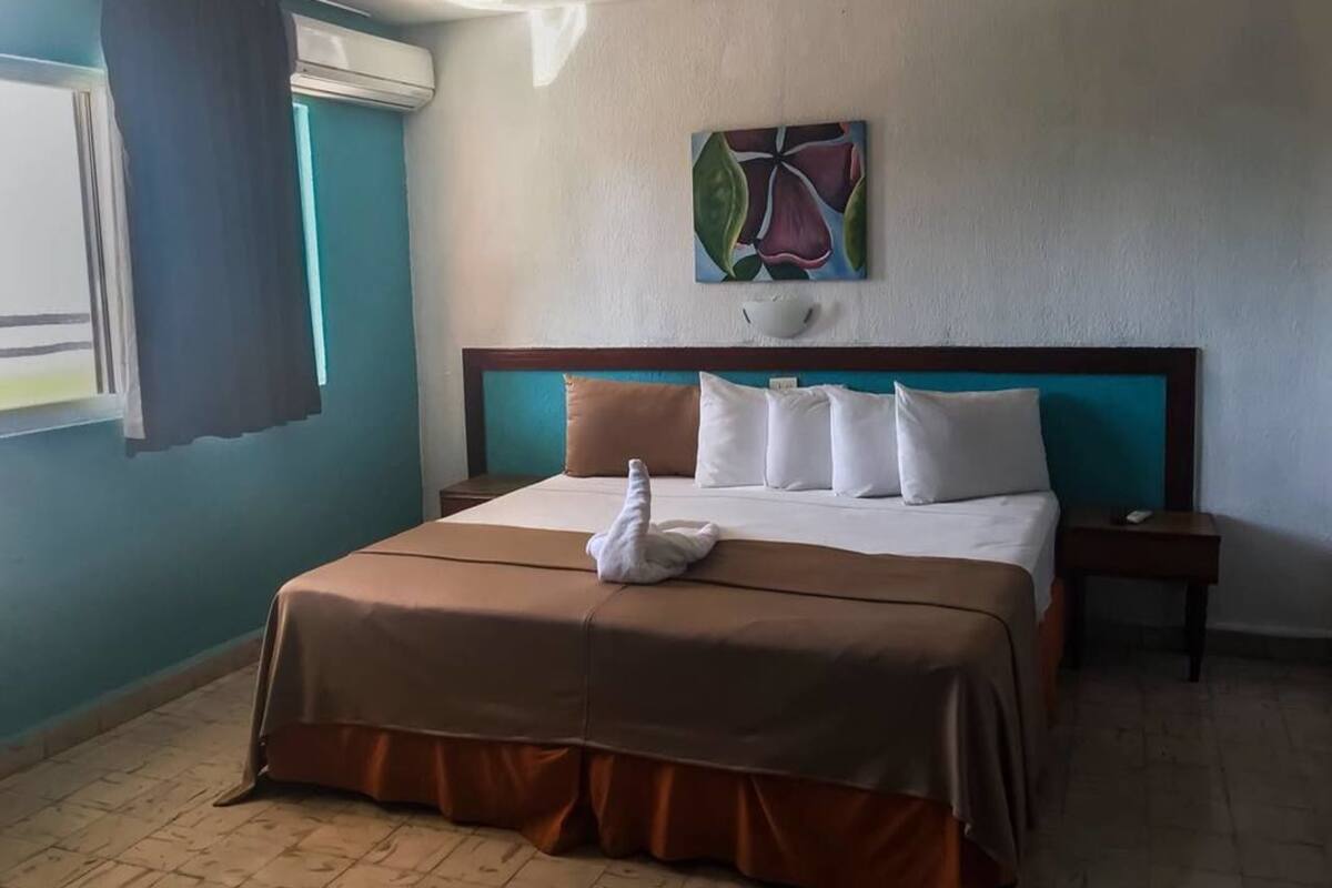 Family Room, Terrace, Ocean View | Desk, WiFi (free), bed sheets