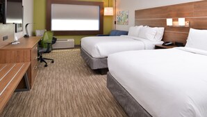 A hotel room with two beds, a desk with a chair, a TV, and a window with blinds. - Holiday Inn Express Early by IHG (Early)