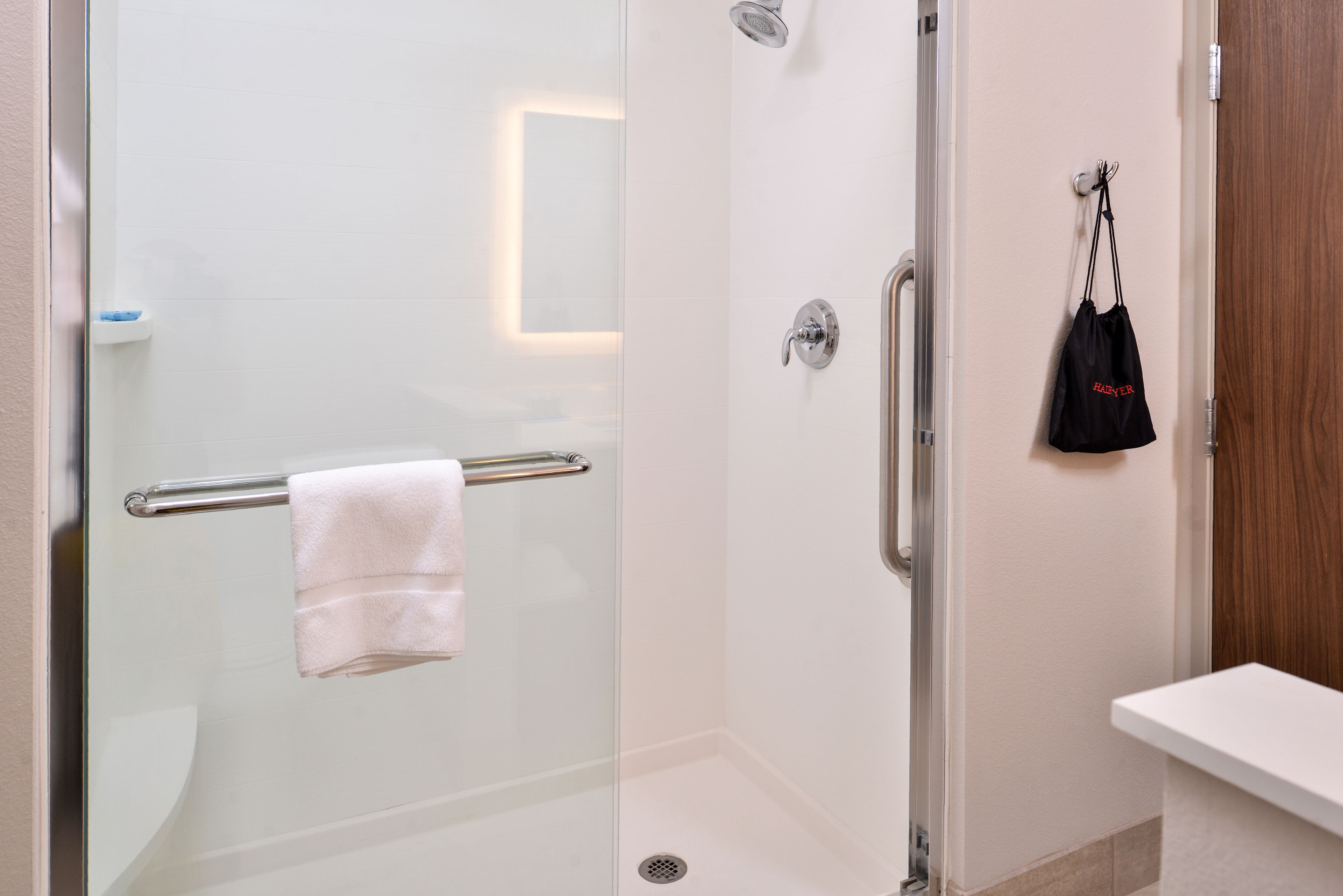 combined shower/bathtub, free toiletries, hair dryer, towels