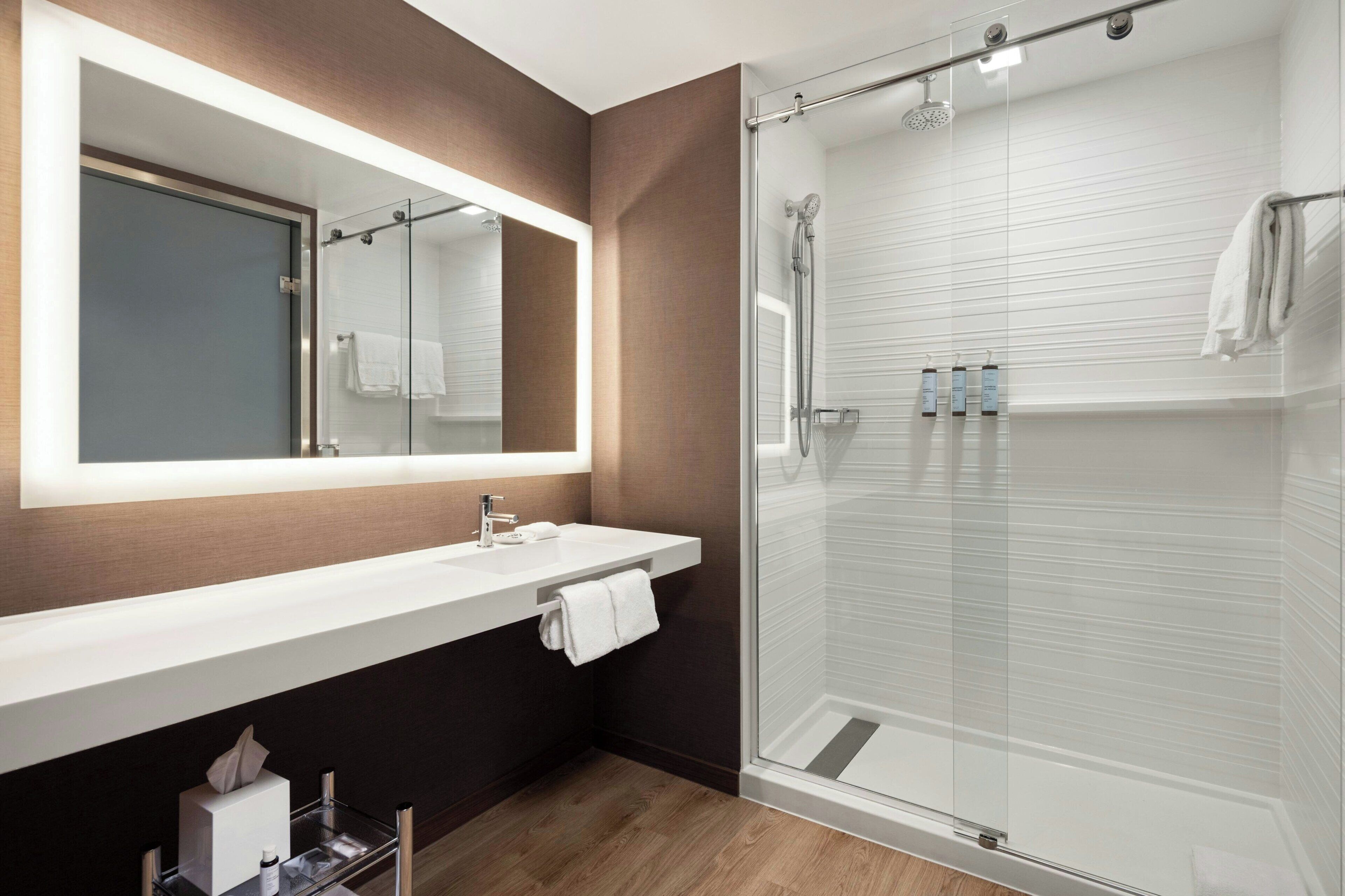 shower, free toiletries, hair dryer, towels