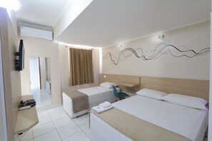 Superior Triple Room, Multiple Beds | Desk, laptop workspace, blackout drapes, free WiFi