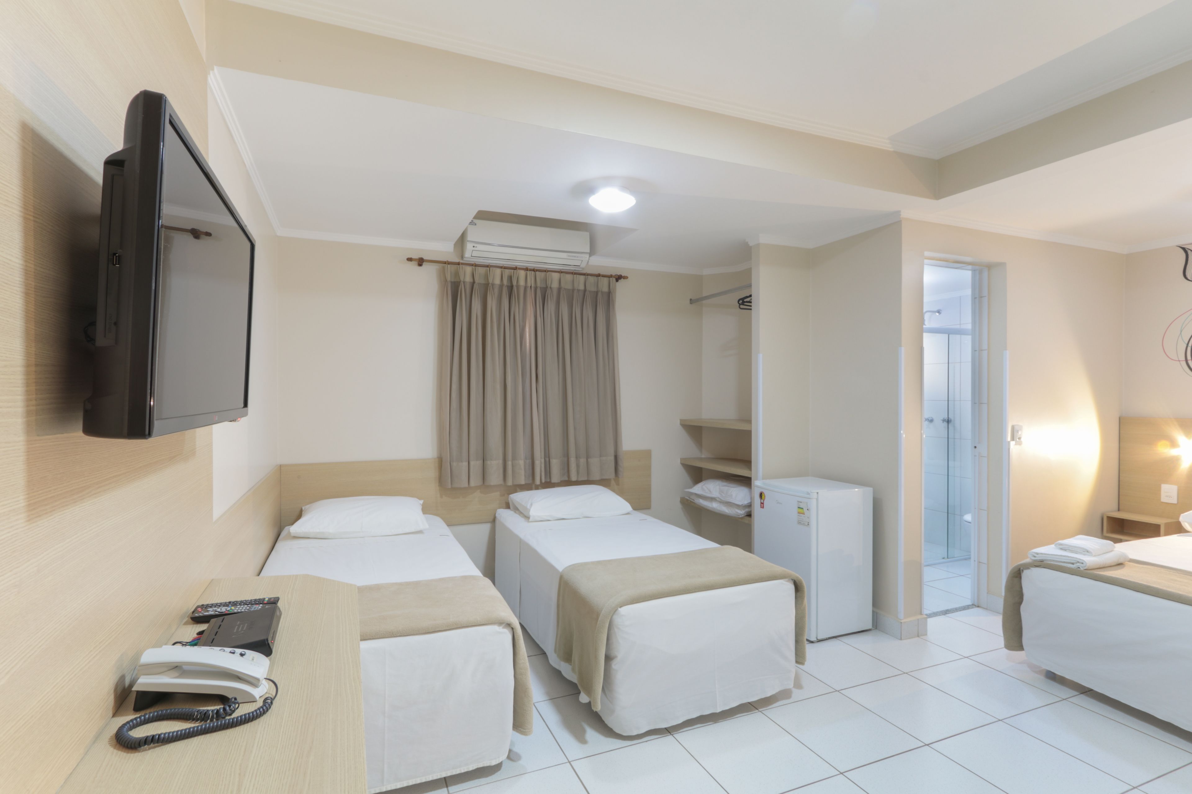superior quadruple room, multiple beds | desk, laptop workspace, blackout curtains, free wifi