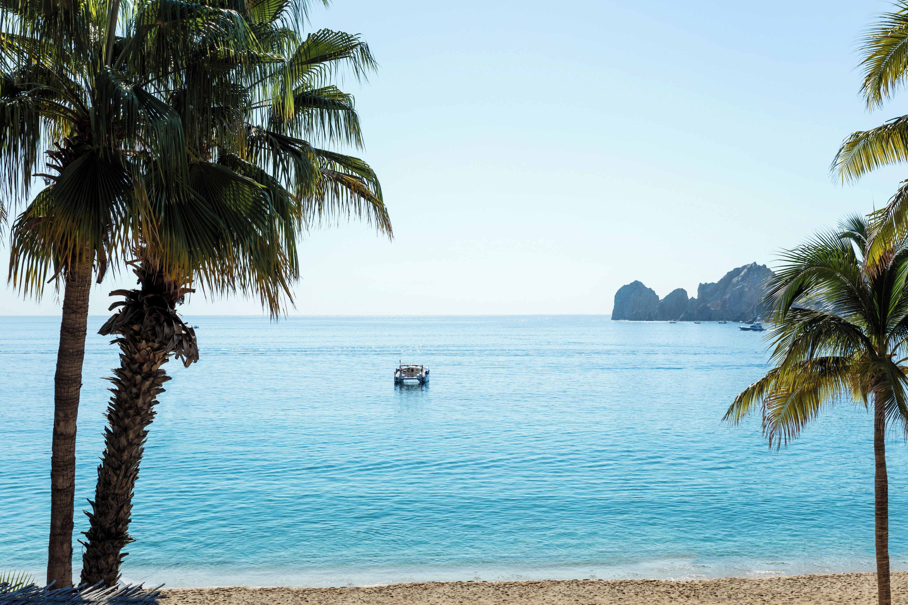 On the beach, sun-loungers, beach towels