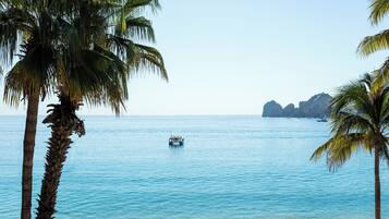 On the beach, sun-loungers, beach towels