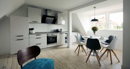 Vacation apartment on the Strelasund 150m to the beach WLAN 250Mbits & e-car connection